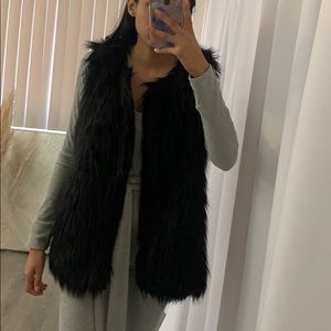 Faux fur black leather vest